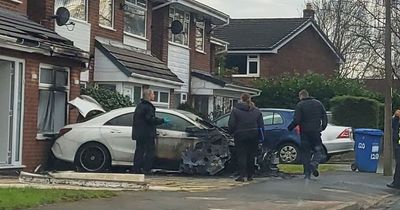 Family forced to escape from house in middle of the night after car blaze spreads to home following suspected arson