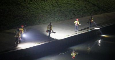 Huge emergency services presence as crews scour river after people 'enter water'