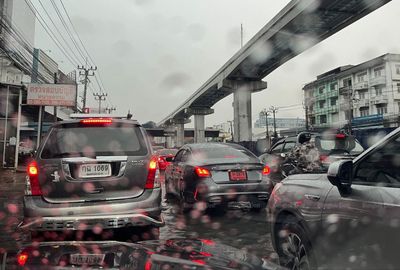 Rain pounds Bangkok, commuters stuck in traffic jams