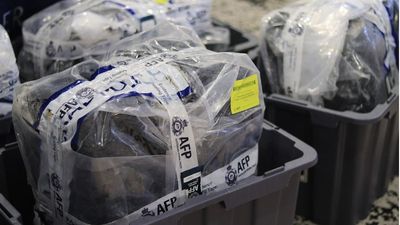 Northern Territory police arrest man linked to 365kg 'esky rescue' cocaine seizure off southern Western Australia