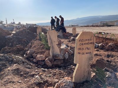Turkey buries its earthquake dead in small cemeteries and mass graves