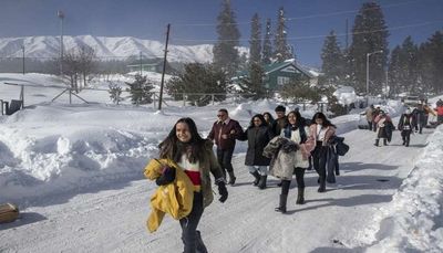 Kashmir: Tourists Flock To Gulmarg As Snow Covers Ski Resort