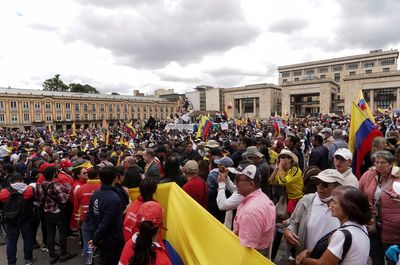 Thousands march across Colombia to oppose government reforms