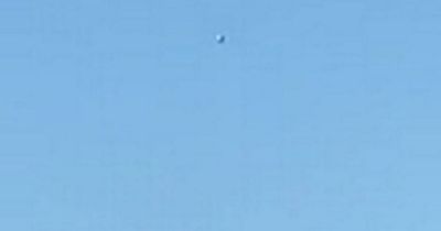 Man captures footage of mystery UFO flying through the sky after US incidents