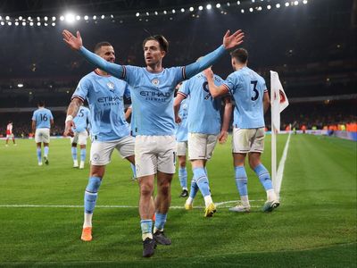 Man City beat Arsenal to go top in Premier League title fight