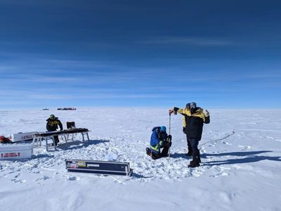 Scientists battle blizzards for million-year ice summit