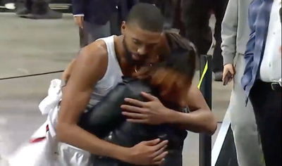 Mikal Bridges rushed to give his mom his jersey after his career-high scoring game