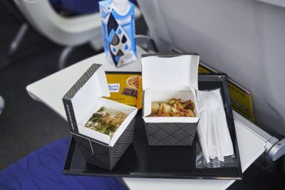 Prawns out, chickens in to cut airline meal costs