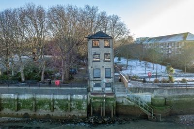 Rotherhithe’s ‘leaning tower’: strange, solitary house on the Thames to go up for auction next month