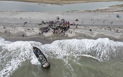 Boat carrying 69 Rohingya lands in Indonesia's Aceh