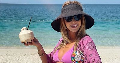 Amanda Holden confuses fans by 'looking 25' in bikini as she celebrates 52nd birthday