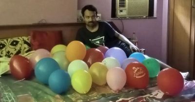 Man in love with balloons shares bed with them and can't live without his lovers