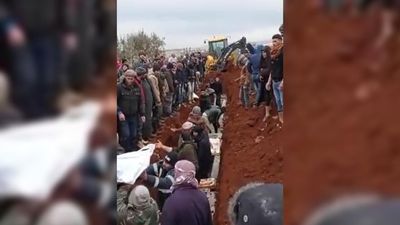 In Syria, rescue workers are digging mass graves for earthquake victims