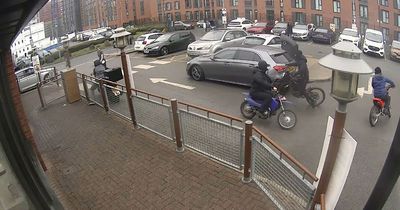 Shocking CCTV shows brazen gang in balaclavas stealing motorbike outside Salford McDonalds