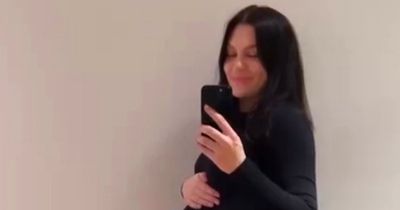 Pregnant Jessie J shows of blossoming baby bump in figure-hugging dress