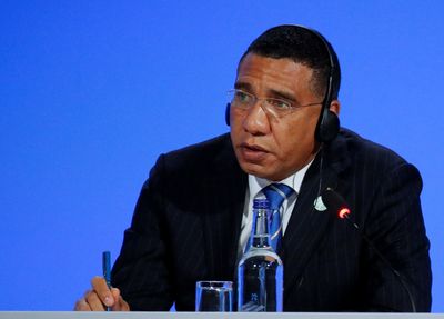 Jamaica PM will not face corruption charges, despite 'evidence'