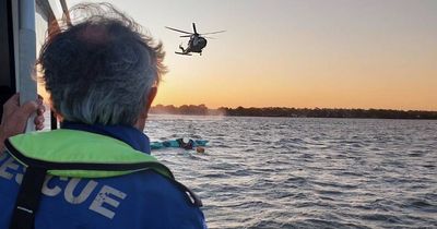 Marine Rescue crew pulls kayak paddler from water