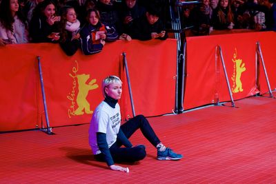 Climate activists glue themselves to Berlinale's red carpet