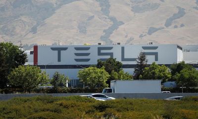 Tesla fires more than 30 workers after union drive announcement