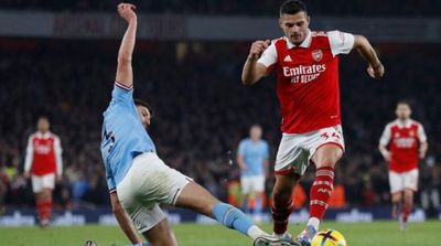 Arsenal Seek Swift Response to Take Title Fight to Man City