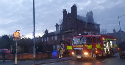 Firefighters tackle fire in derelict pub as people asked to avoid area