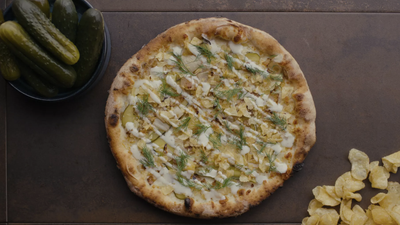 This year's pizza trends: Fewer pineapples, more pickles