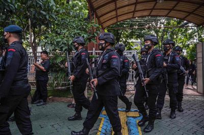 Indonesian football fans face police tear gas again