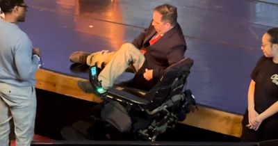 Man forced to crawl onto stage due to 'humiliating' lack of wheelchair access