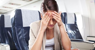 'A woman stole my plane seat and wouldn't move - so I kicked her chair every 2 minutes'