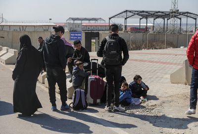 After devastating quake, thousands of Syrians return home to war zone