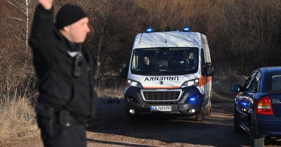 Abandoned lorry found with 18 dead bodies inside after group suffocate