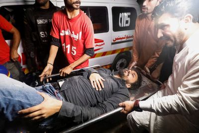 Pakistan militants launch deadly suicide attack on police headquarters in Karachi