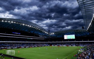 Wild storm slams Sydney as the heat builds in the west