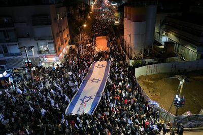 Israelis protest judicial overhaul plans for 7th week
