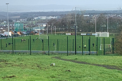 Four arrested after explosive device found near children playing football