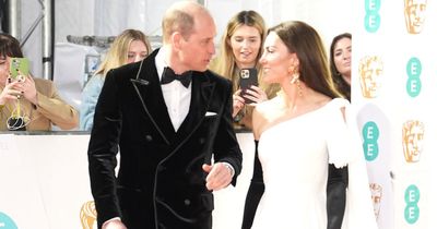 Kate Middleton matches in monochrome to husband William in white gown while Eddie Redmayne goes shirtless at the BAFTAs