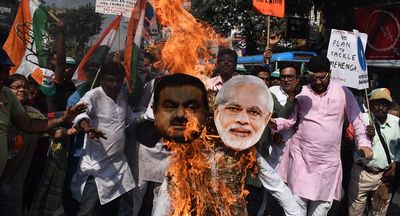 ‘Brazen cronyism’: All eyes on Modi following explosive Adani allegations