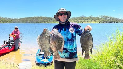 Passionate pest fish busters taking out aggressive, invasive fighting species of tilapia and carp