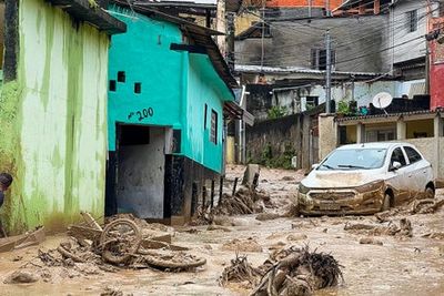 Brazil floods: Dozens dead and carnival festivities cancelled after torrential rain
