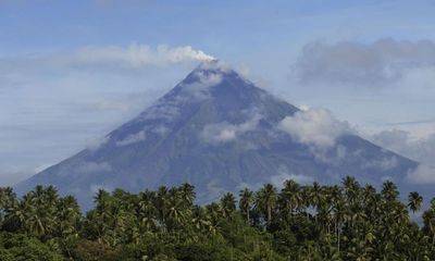 Search for wreckage atop volcano after plane with two Australians goes missing in Philippines