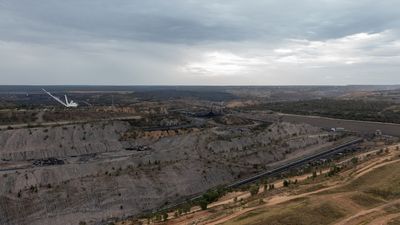 ASX in the red, Coles profit soars, while BHP profit falls as it puts more coal mines up for sale — as it a happened