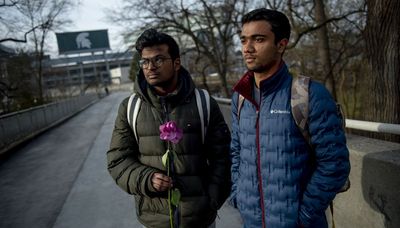 Students, faculty return to Michigan State University, a week after mass shooting