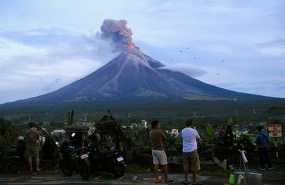 Rescuers in high-risk volcano search for crashed Philippine plane