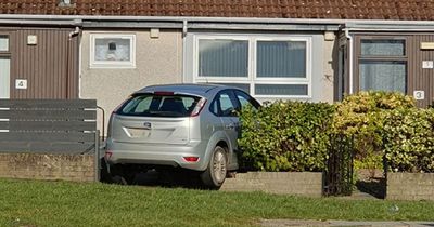 Car smashes into home as residents on Scots street report 'hearing bang'