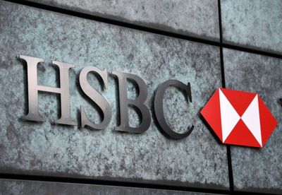 HSBC pre-tax profit slumps on France sale