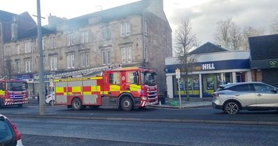 Fire crews called out to Lanarkshire town centre after blaze behind bookies