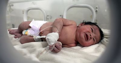 Baby born in rubble of Turkey-Syria earthquake is adopted by aunt and uncle - and renamed