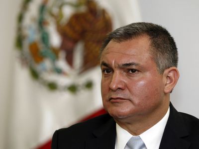 Mexico's former public security head is convicted in the U.S. of taking cartel bribes