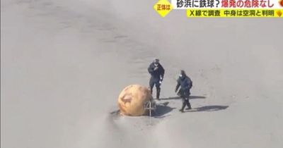 'Mysterious ball' washes up on Japan beach sparking investigation by baffled officials