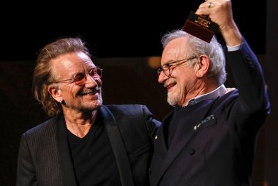 Bono presents Steven Spielberg with lifetime award at Berlin film festival